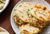 Reina Pepiada Arepa: Classic Venezuelan Chicken & Avocado Sandwich