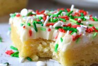 Festive Christmas Sugar Cookie Bars with Vanilla Frosting