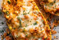 Chicken Enchilada Stuffed Spaghetti Squash Boats