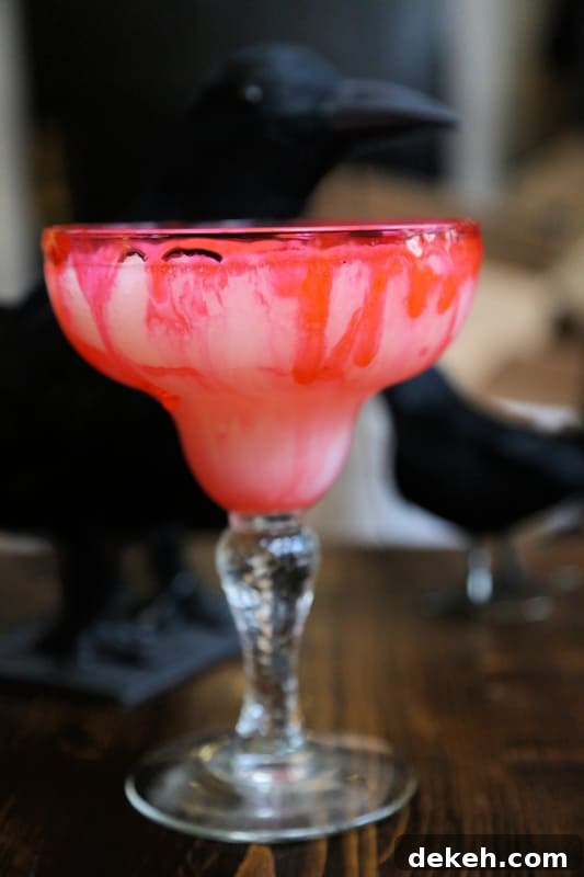 fake blood dripping on the side of a margarita glass