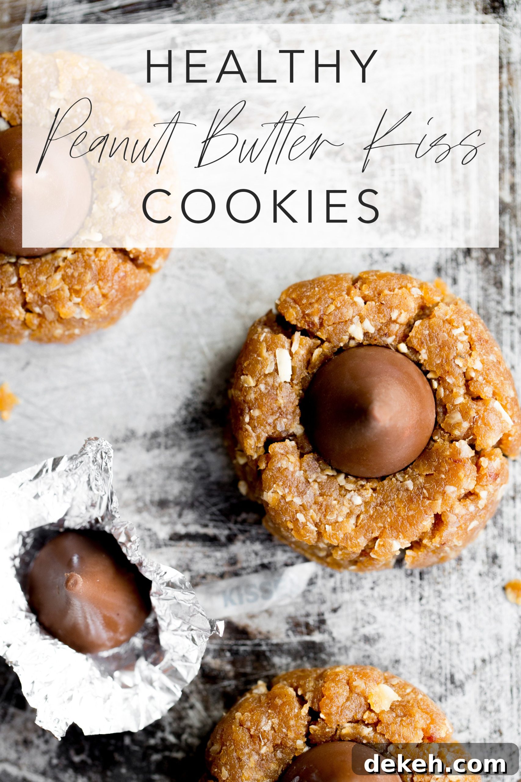 top down photo of healthy peanut butter kiss cookie on sheet pan with title text overlay