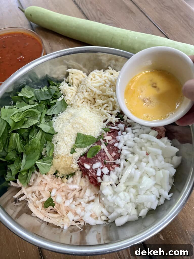 Adding beaten eggs to a bowl full of all the other stuffing ingredients, with a cucuzza squash and bowl of tomato sauce in the background.