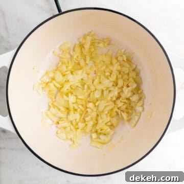 Sautéed garlic and onion in a large pot.