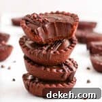 Stack of 4 chocolate tarts.