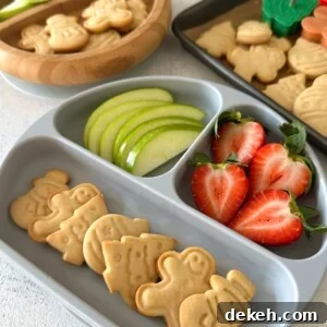 Mini sugar cookies served with fruits.