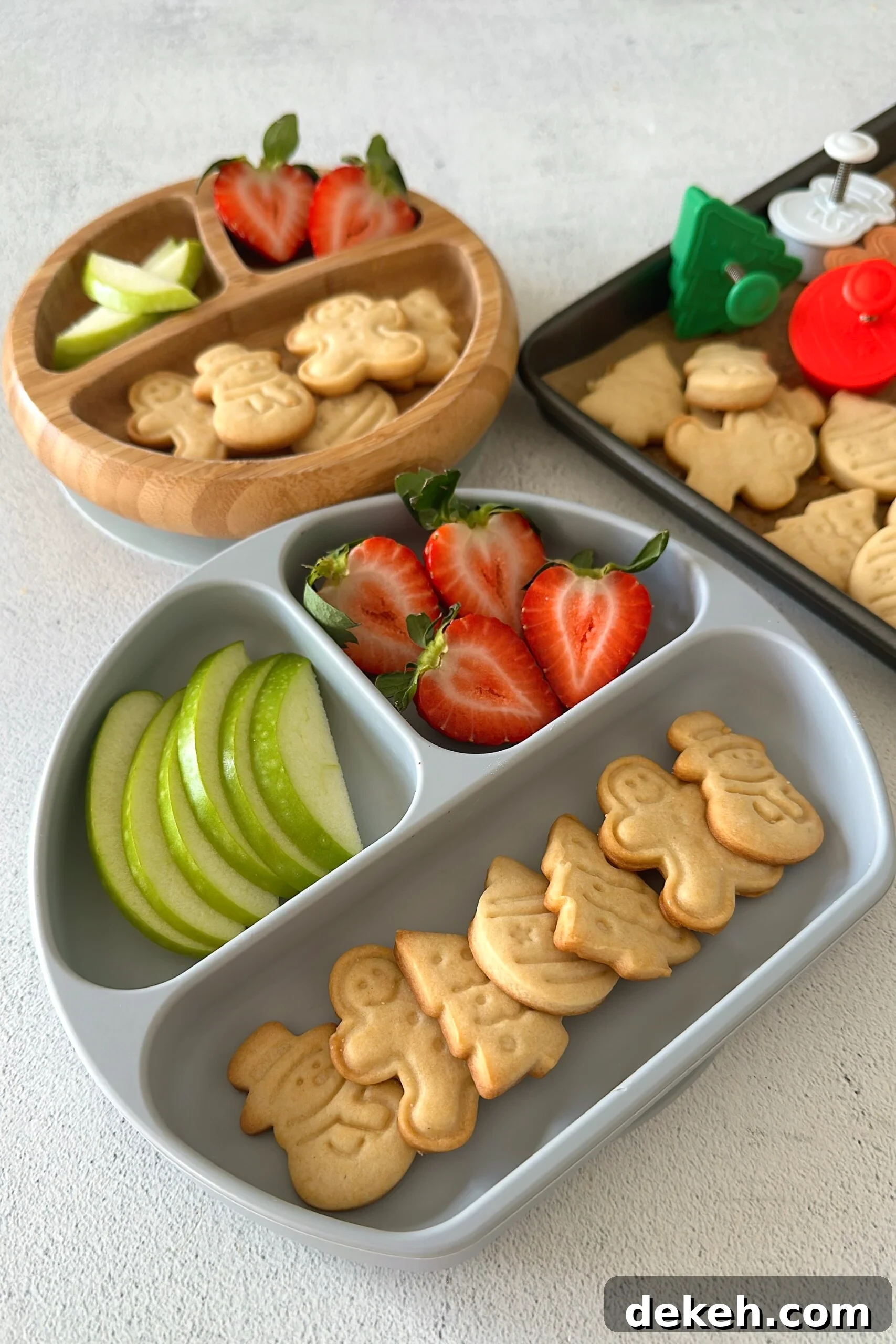 Mini sugar cookies served with fruits.