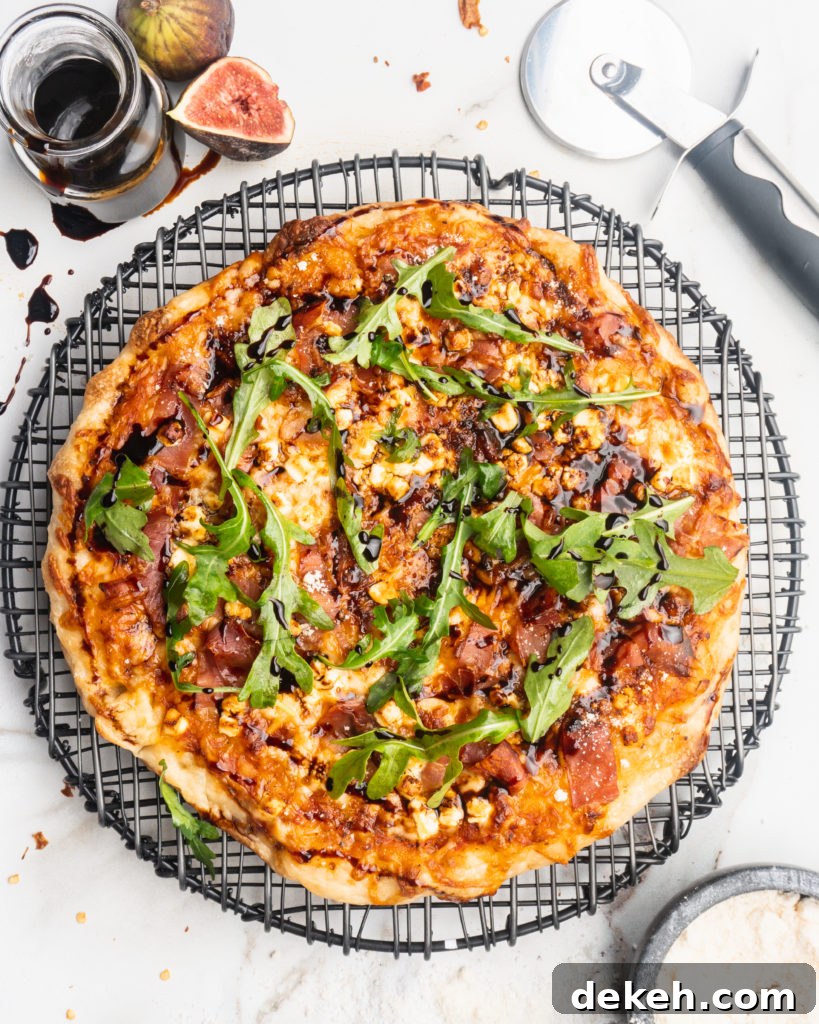 Prosciutto, goat cheese, and balsamic reduction are added to your typical pizza, and then baked in a cast iron pan to create a pizzeria style pizza at home!