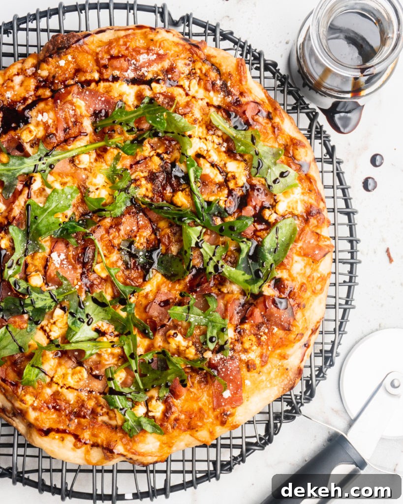 Prosciutto, goat cheese, and balsamic reduction are added to your typical pizza, and then baked in a cast iron pan to create a pizzeria style pizza at home!