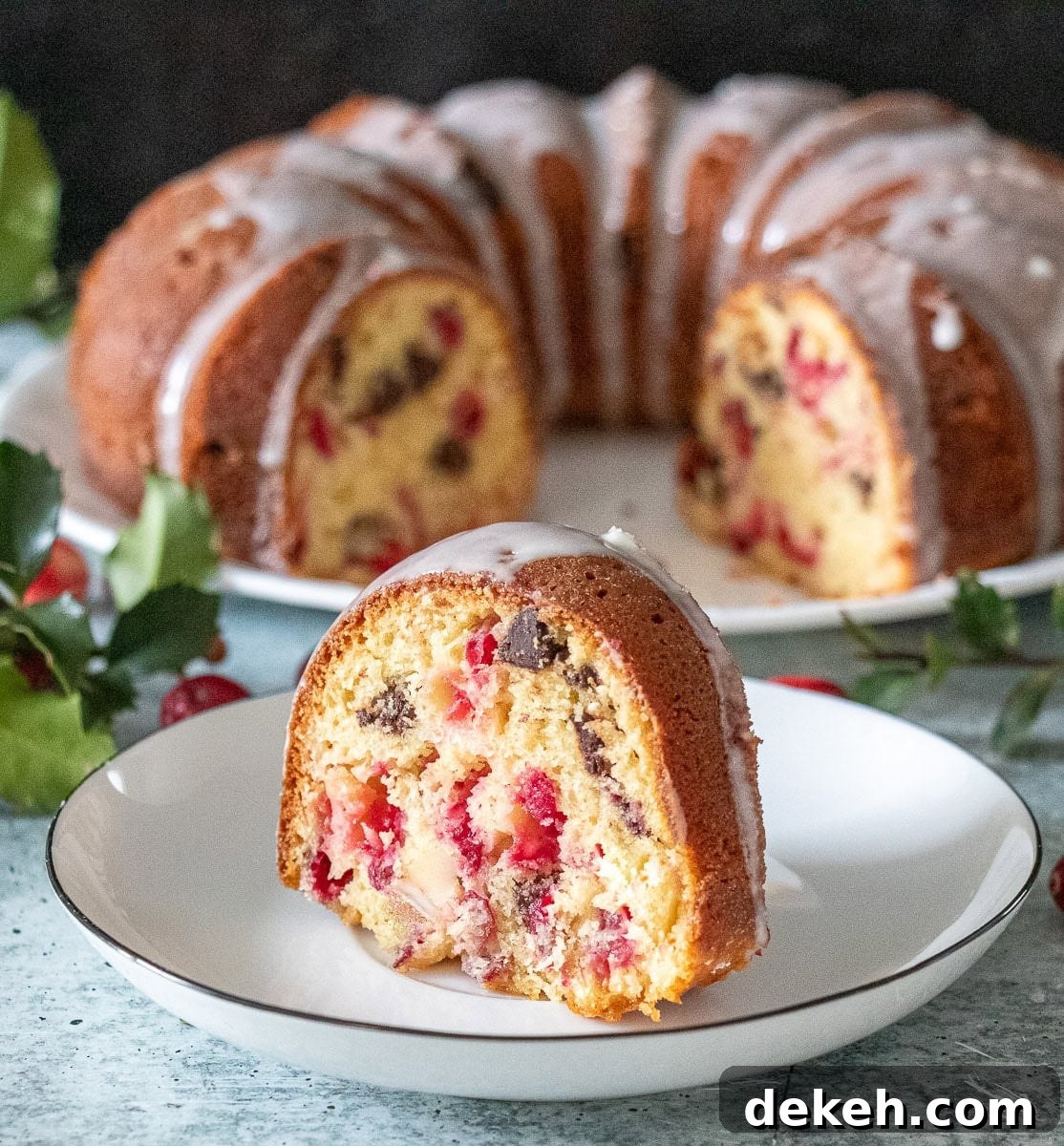 Sweet, tart, and full of chocolatey goodness, this Cranberry Eggnog Chocolate Chip Cake is the ultimate holiday dessert! Quick and easy to make—no mixer needed—this festive cake combines rich eggnog flavor with juicy cranberries and chocolate chips for a delicious Christmas or New Year treat!
