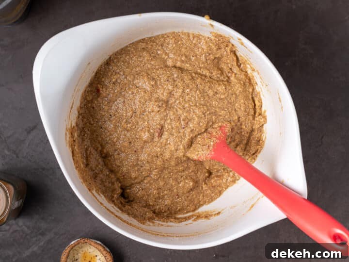 mixed muffin batter in a white bowl