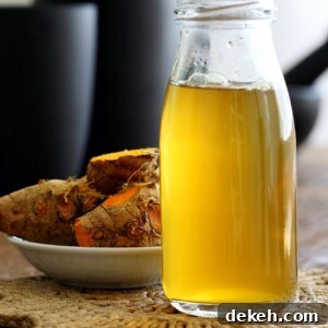 Ginger Turmeric Root Tea. Fresh Turmeric Root and ginger simmered with black pepper. Add sweetener of choice. Serve hot or chilled. Vegan Gluten-free Recipe | VeganRicha.com #glutenfree #veganricha #vegan