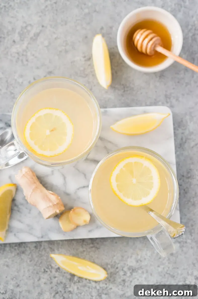 honey ginger tea in glass cups with lemon slices