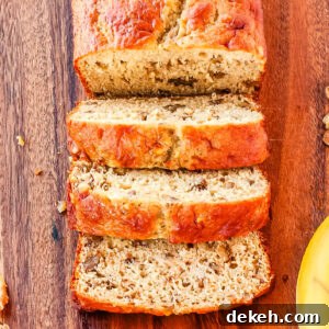 Slices of bread on a wooden cutting board.