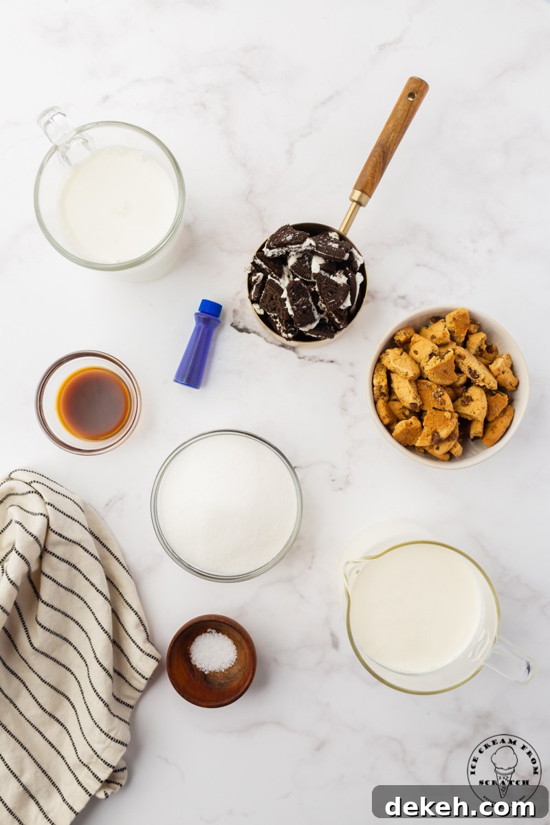 The ingredients for easy cookie monster ice cream measured out into separate bowls and set on a marble counter, viewed from above