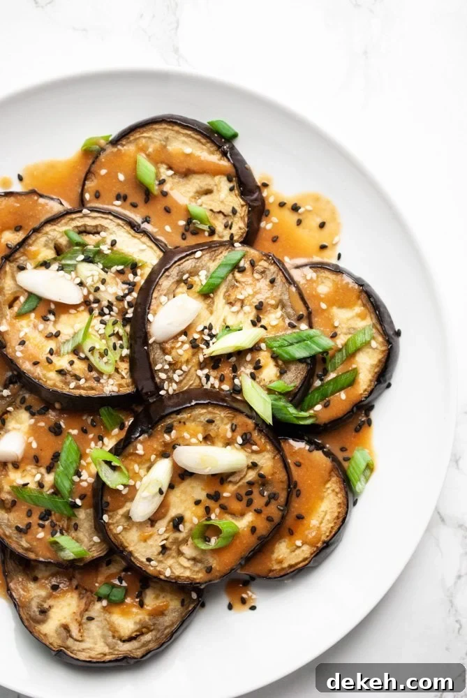 oven roasted eggplant rounds drizzled with miso sauce
