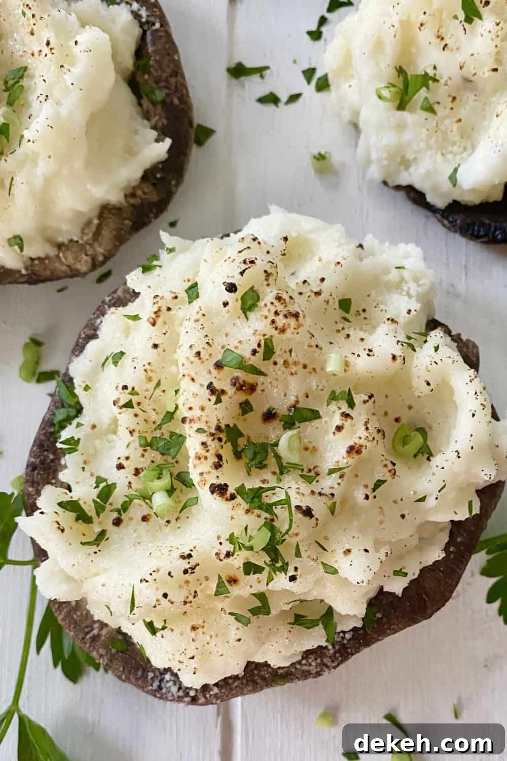 A  plate of vegetarian mashed potato stuffed mushrooms.