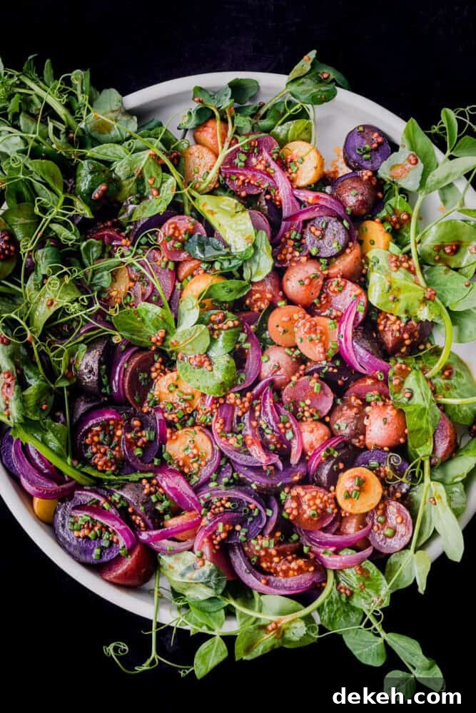 colorful no mayo potato salad with baby potatoes, shallots, watercress and herbs