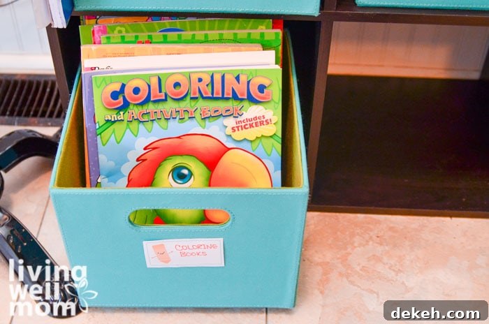 storing kids coloring books in a blue cube 