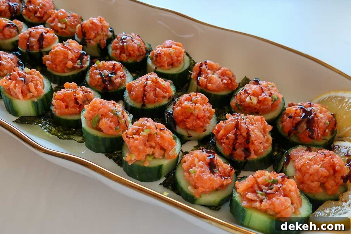 Light drizzle of balsamic glaze over cucumber and salmon bites
