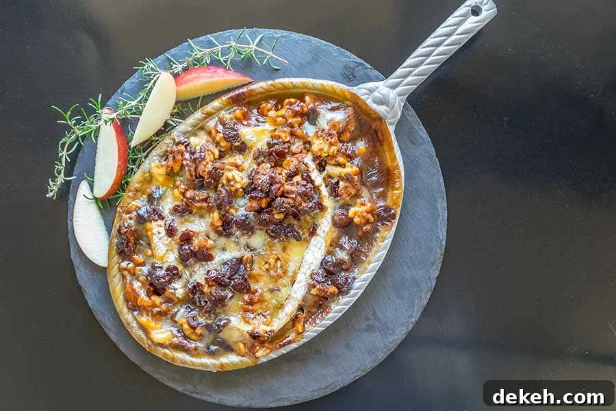 hot camembert dip appetizer in a skillet