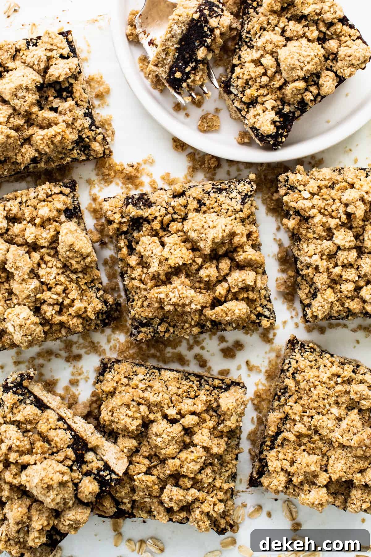 A plate of chocolate graham cracker bars on a white plate.