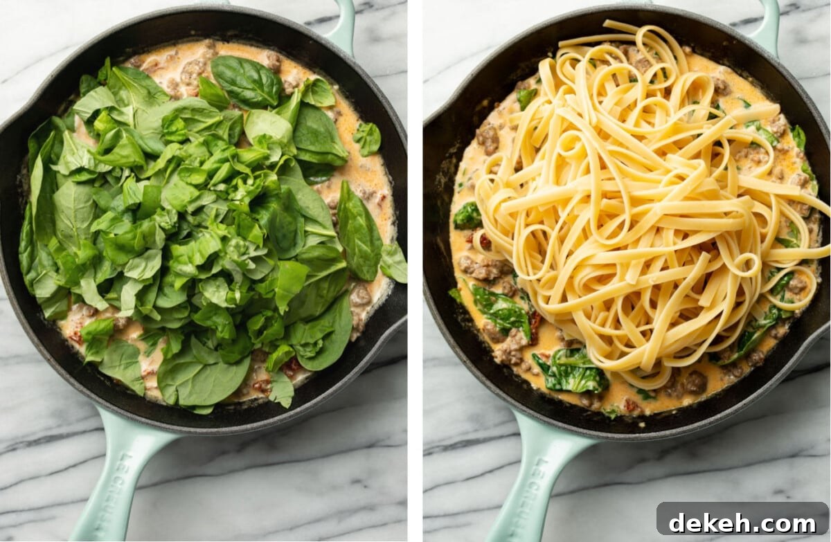 adding spinach and basil to a skillet and tossing with pasta for tuscan sausage pasta