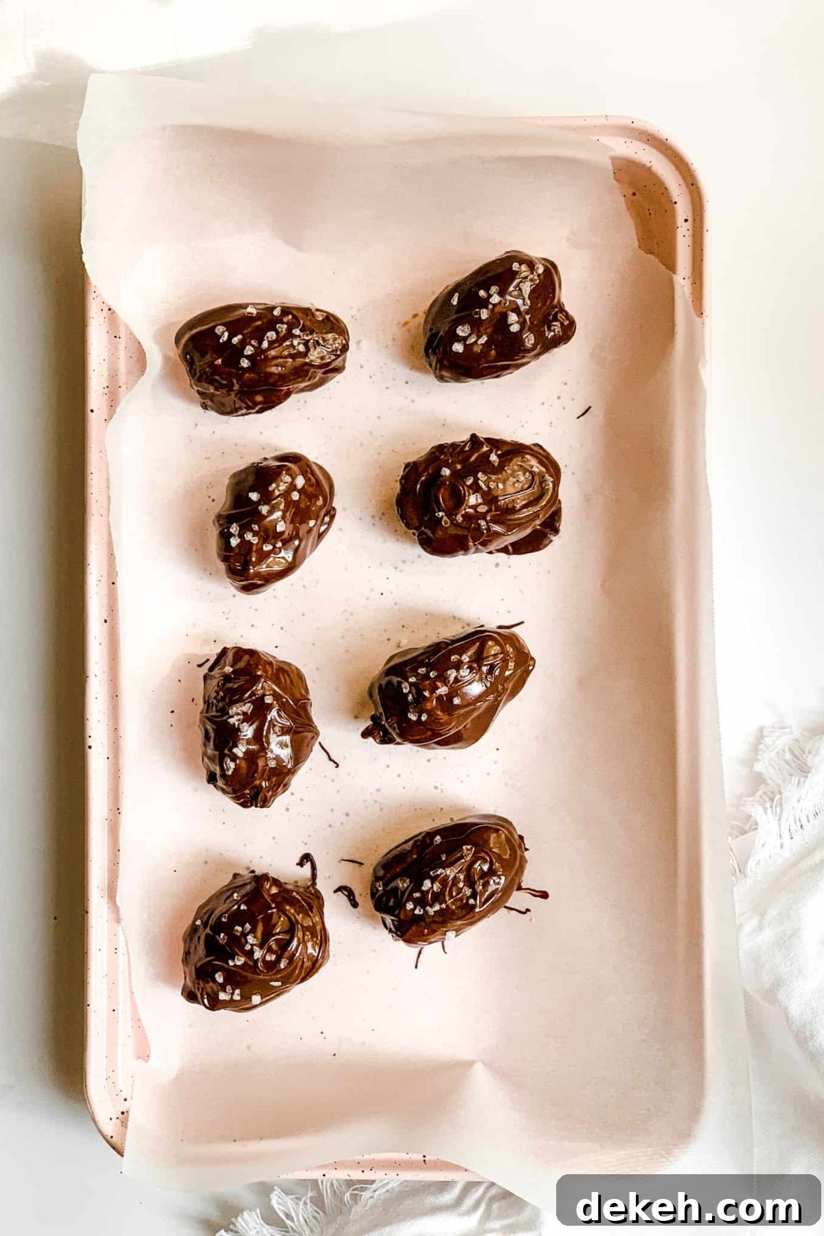 Pink Baking Sheet with Healthy Salted Chocolate Date Candies