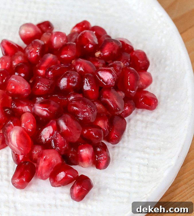 Beautiful delicate pomegranate arils; Chocolate Pomegranate Mousse; 2015 Jane Bonacci, The Heritage Cook