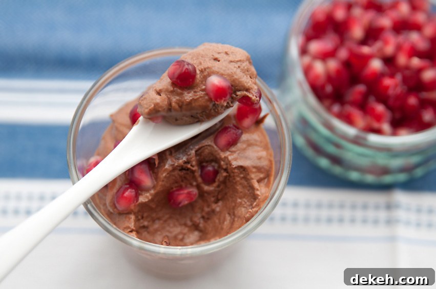 The first bite; Chocolate Pomegranate Mousse; 2015 Jane Bonacci, The Heritage Cook