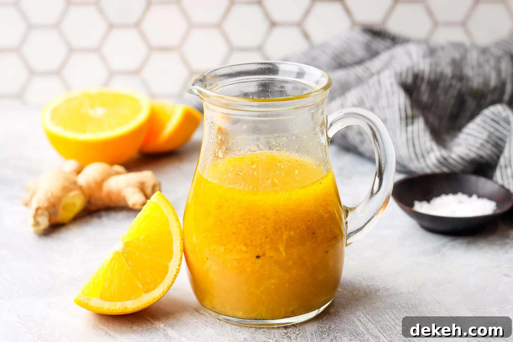 a jug of orange ginger dressing