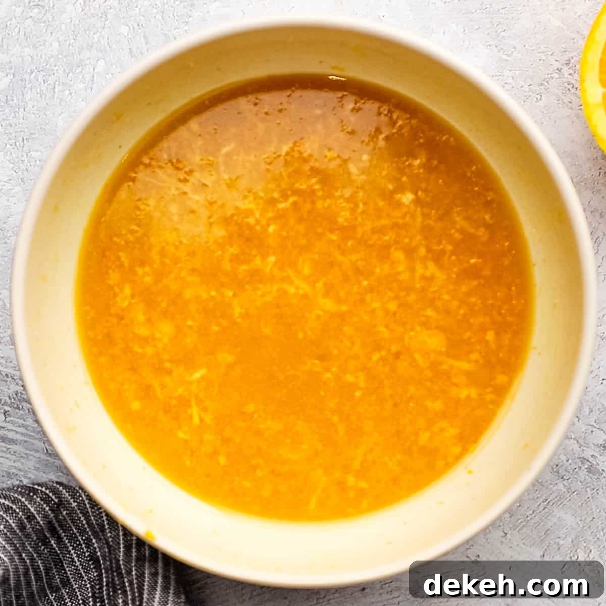 orange ginger dressing in a small bowl