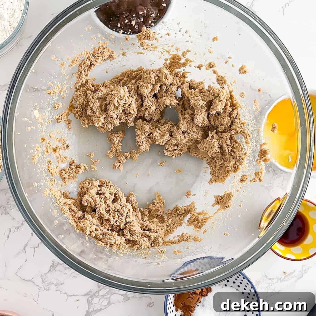 Creaming the butter and sugar for oatmeal cookies.