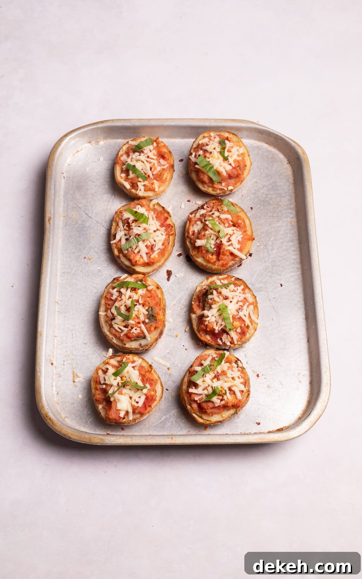 stuffed potato skins with dairy free mozzarella on top.