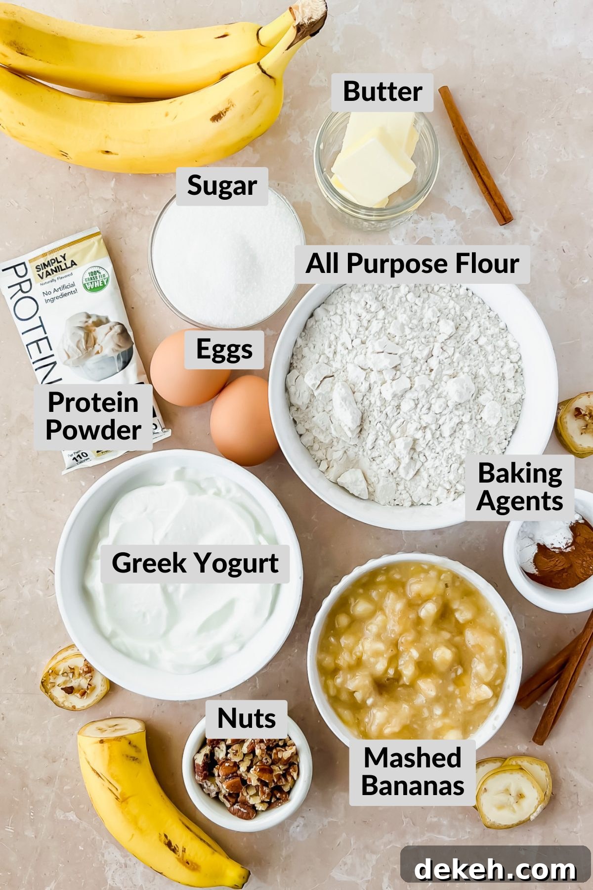 ingredients for greek yogurt banana muffins in individual bowls.