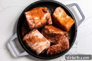 Chunks of pork rubbed in spices.