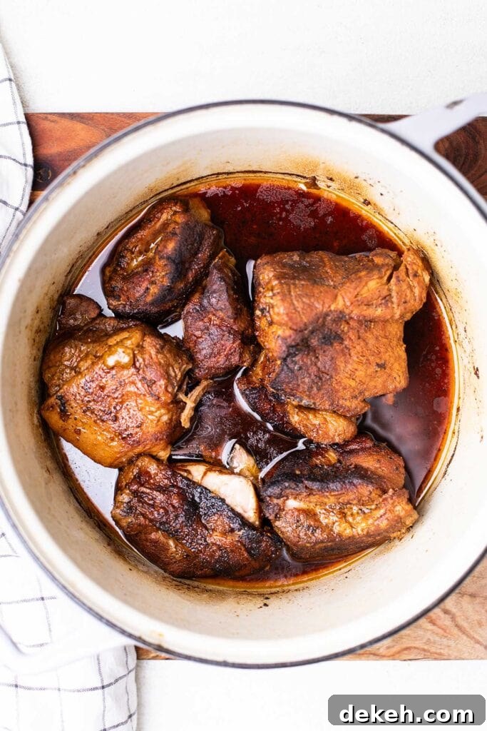 Bake the pork for 2 - 2 1/2 hours until it's fall apart tender.