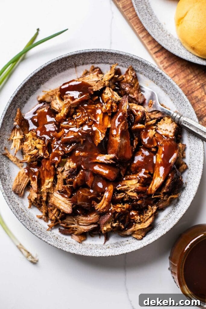 Shredded pork drizzled with honey bbq sauce.