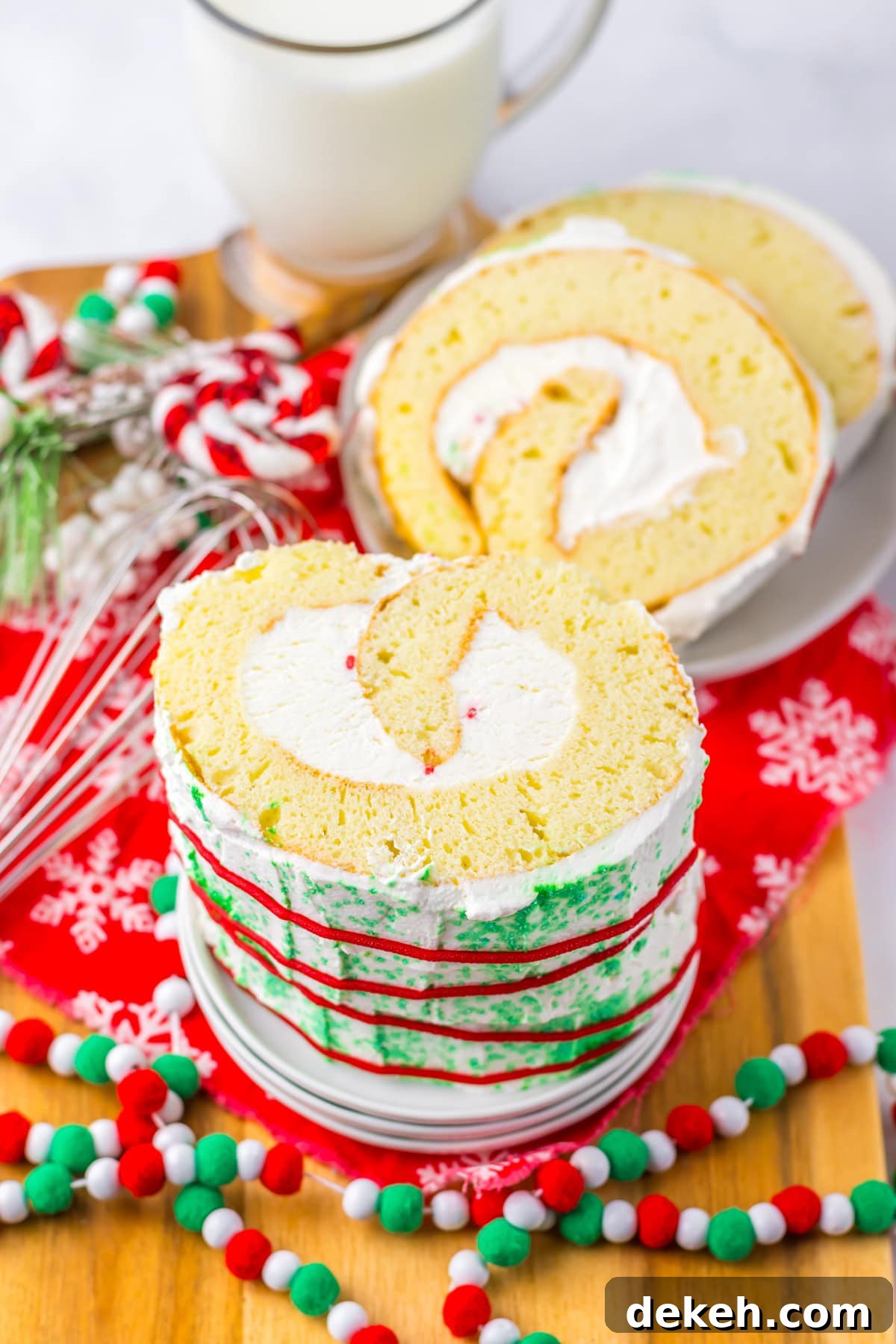 An image of the Christmas roll cake sliced in half.