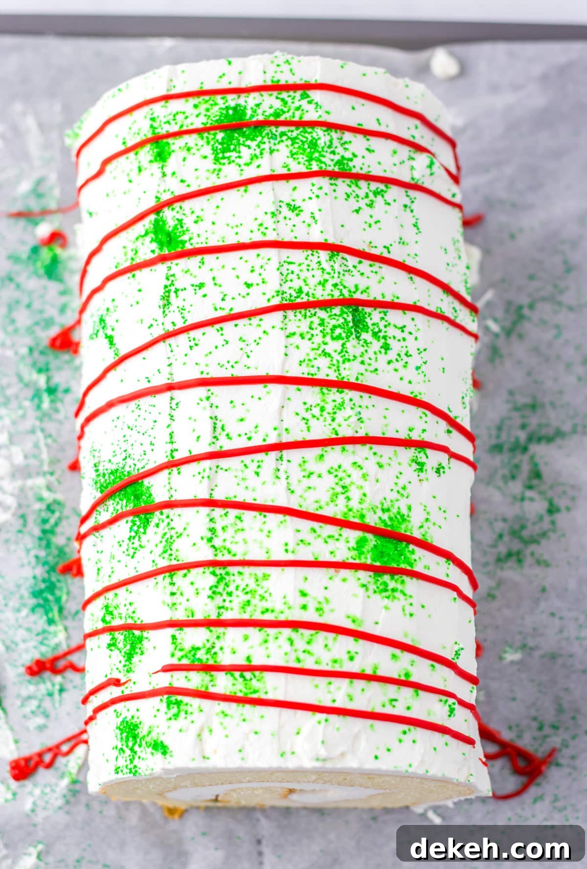 An overhead image of decorating the cake roll.