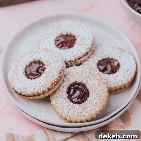 An image of Linzer cookies on a plate.