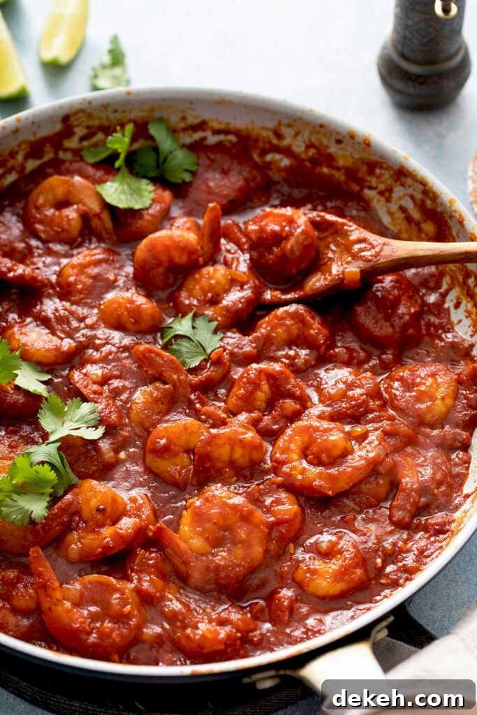 Diablo Shrimp (Camarones a la Diabla) — Spicy Mexican Shrimp Recipe 2 Skillet filled with shrimp tossed in spicy red chile sauce.