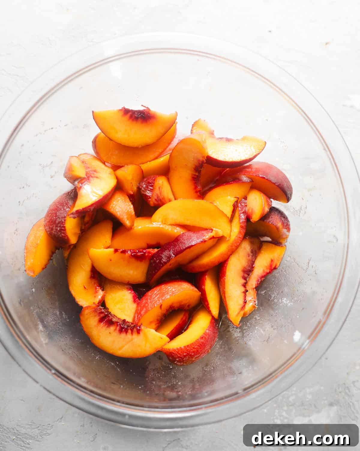 macerated peaches in a bowl.
