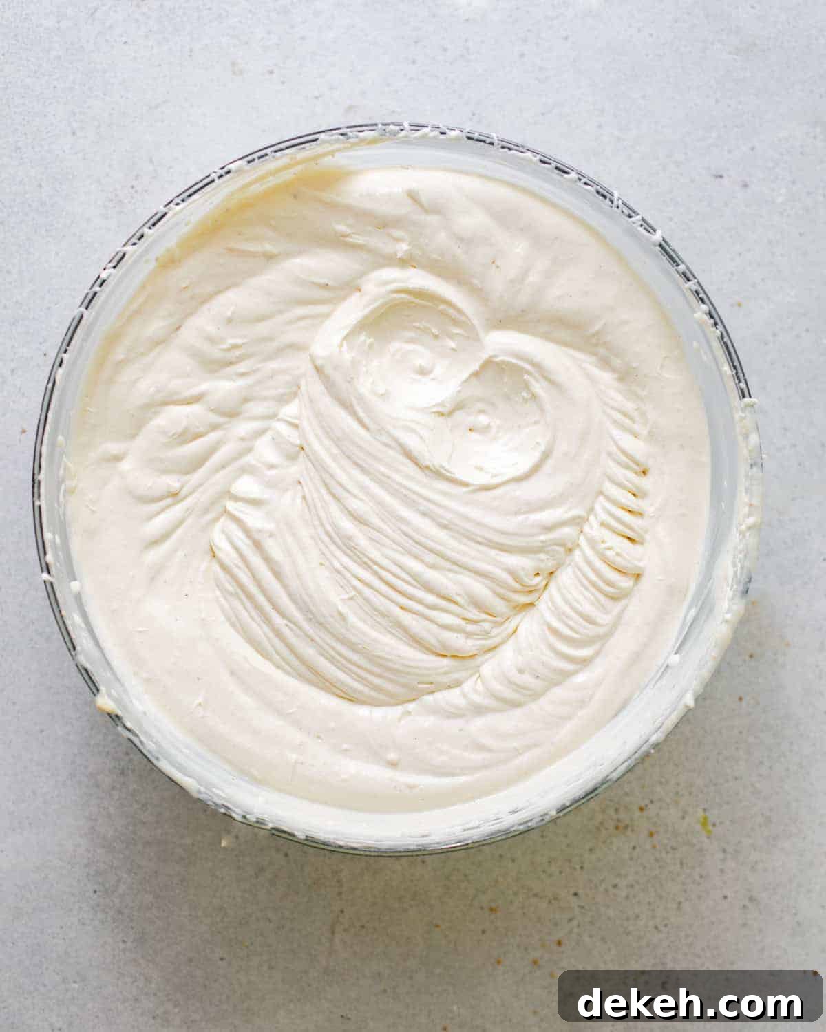whipped cream in a mixing bowl.
