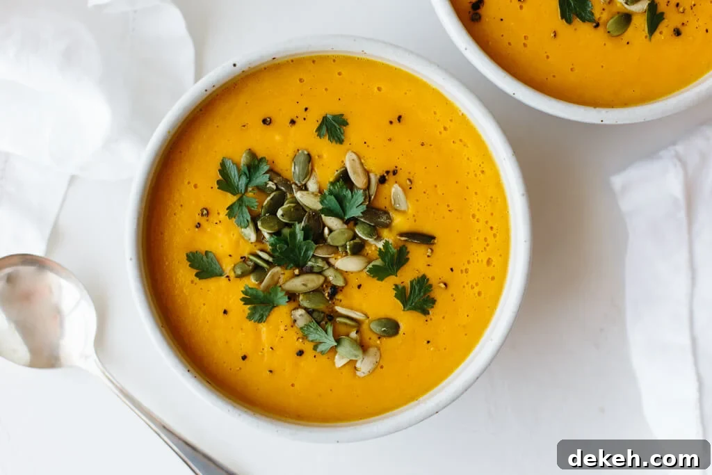 Roasted Butternut Squash Soup is the perfect Thanksgiving, fall and winter soup recipe. It's easy, flavorful and ultra creamy!