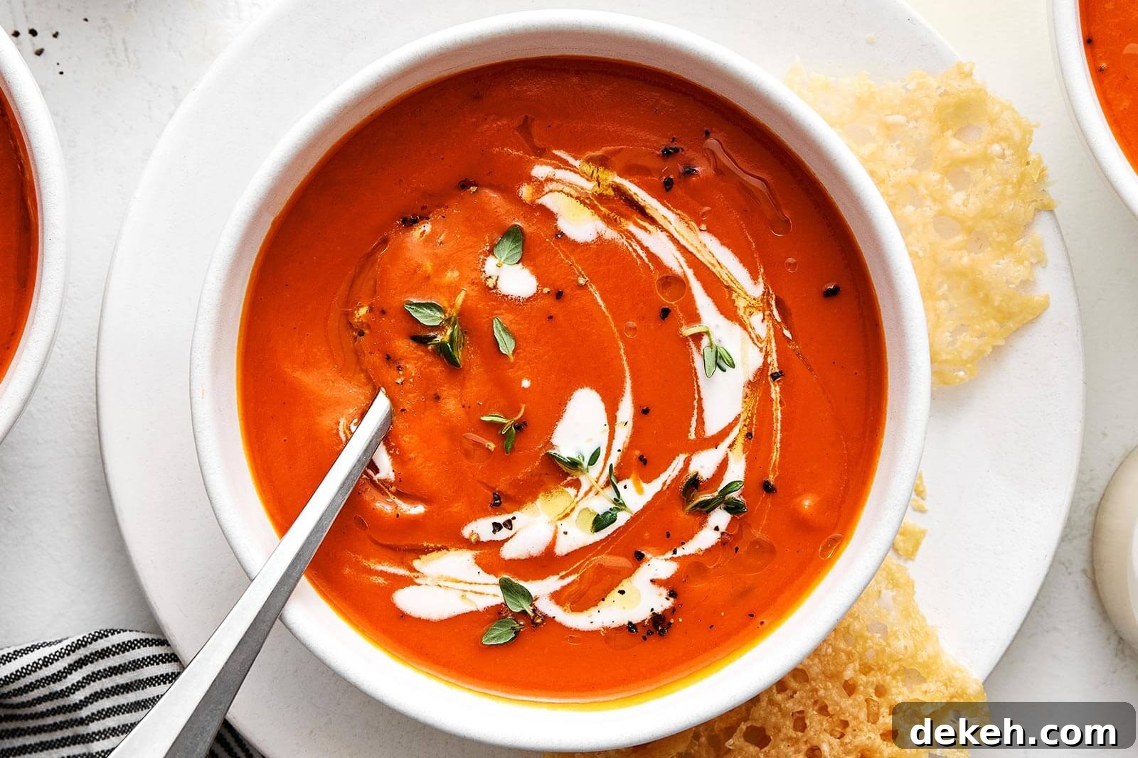 A bowl of creamy tomato soup.