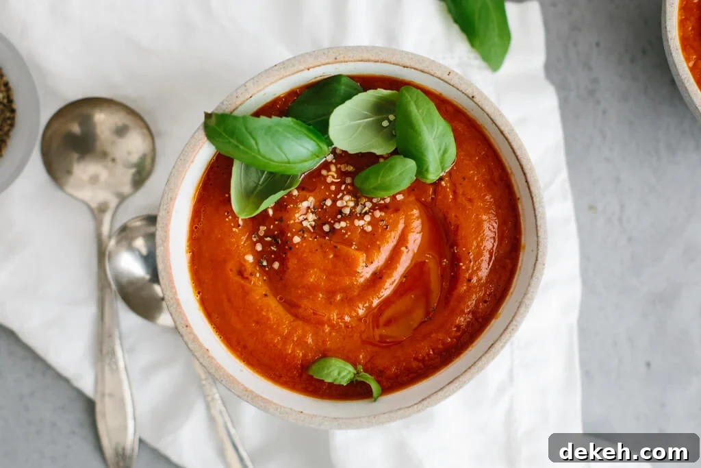 Roasted red pepper soup is a blend of red peppers, tomatoes, onion and garlic. It's a flavorful and healthy soup recipe!