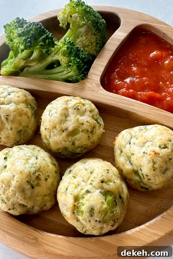 Chicken and broccoli meatballs served with marinara sauce.