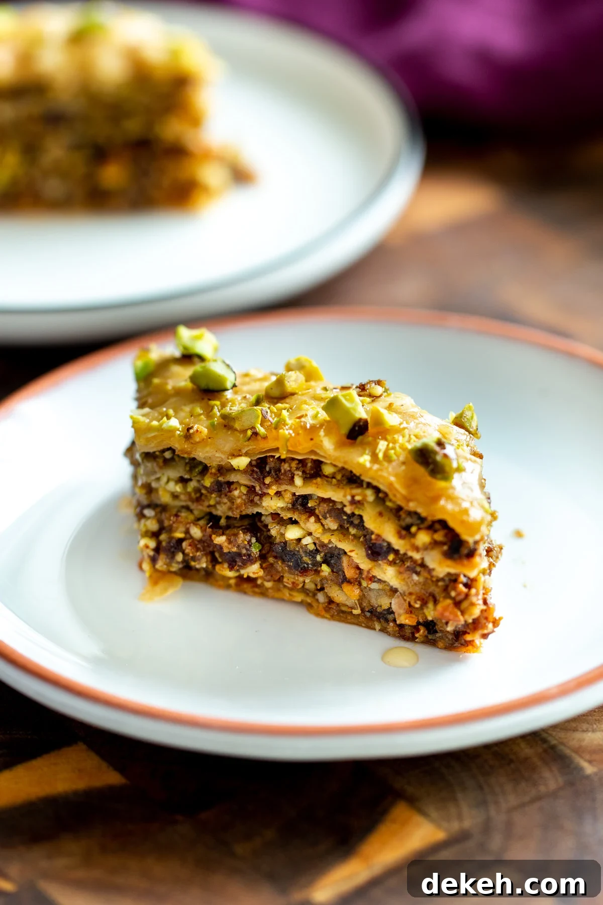  a small piece of vegan baklava on a small dessert plate