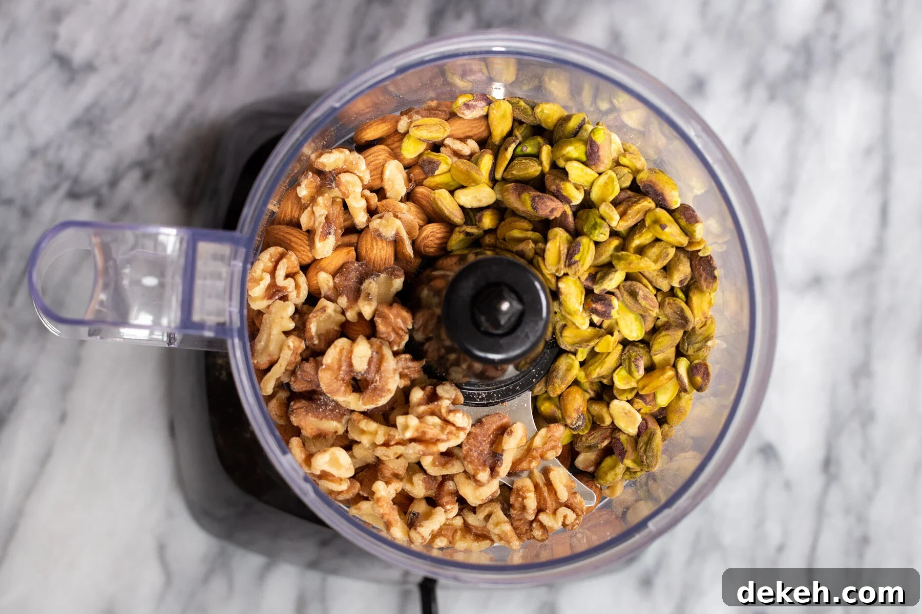 a blend of nuts in a food processor 