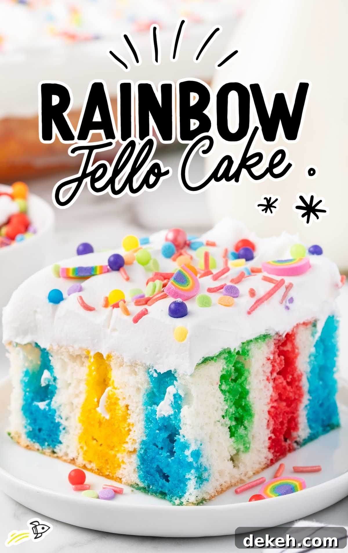 a close up shot of a slice of Rainbow Jello Cake on a plate